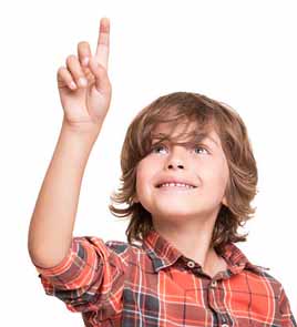 30959415 - cool young boy pointing to empty space over white