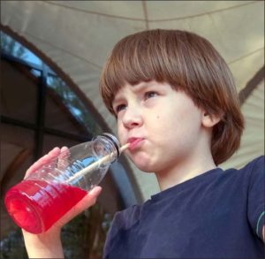 boy drinking soda